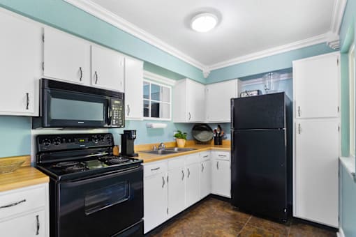 Community room kitchen at Blueridge Terrace Apartments.