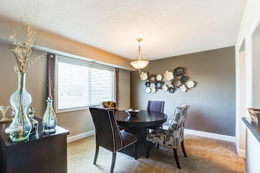 Dining room in a signature series 2-bedroom, 2-bath apartment at Somerset Lakes.
