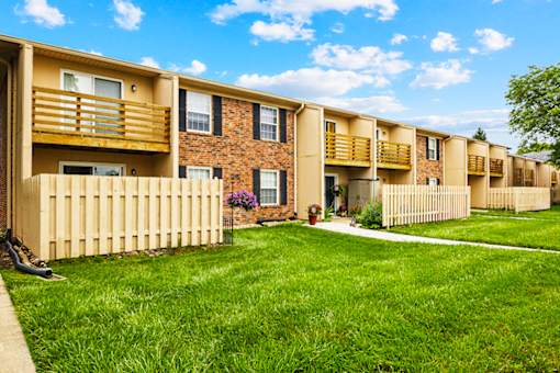 Exterior view of balcony and patio area at Fairington Apartments in Columbus, Indiana.