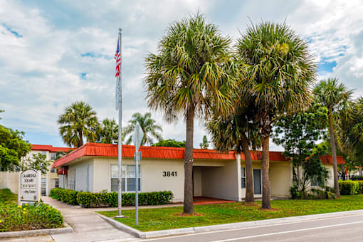 Exterior view of the leasing office at Cambridge Square Apartments in Lauderdale Lakes.
