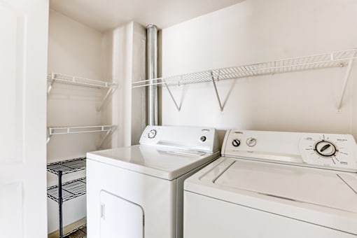 In-unit laundry in a classic series 2-bed, 2-bath apartment at Somerset Lakes, featuring a washer and dryer for convenience.