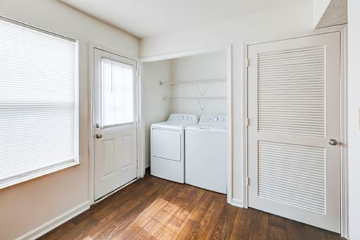 In-unit washer and dryer in a 2- or 3-bedroom townhome at Hampton Place Apartments.