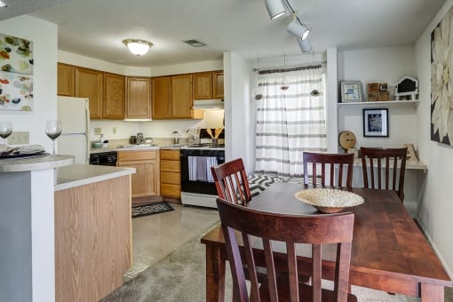 Kitchen and Dining Room with Built in Desk at Ashmore Trace