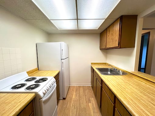 Kitchen in a one-bedroom, one-bathroom apartment at Kentwood Square Apartments.