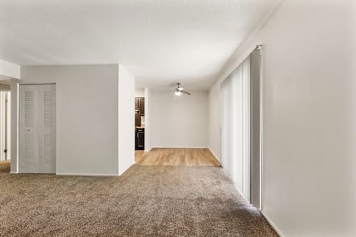 Open-concept living and dining area in a 1-bed, 1-bath apartment at Bradford Lake Apartments.
