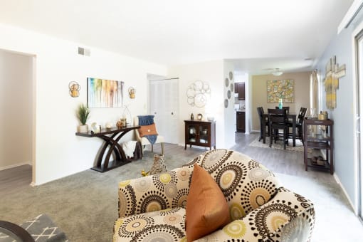 Living and dining room with patio access in a 2 bedroom apartment at Addison on Main