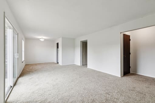 Living and dining area in a two-bedroom apartment at Carriage House Apartments, Muncie, IN