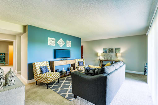 Living room in a Signature series 2-bed, 2-bath apartment at Somerset Lakes, offering a spacious layout.