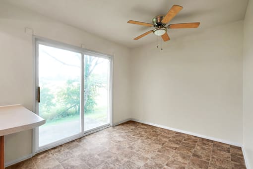 Living room in a 3-bed, 1-bath townhome at Valley Ridge Apartments.