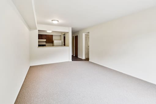 Living room in a one-bedroom, one-bath apartment at Cambridge Square Apartments in Bedford, Indiana.