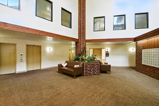 Lobby at Hammond Elderly Apartments with seating area.