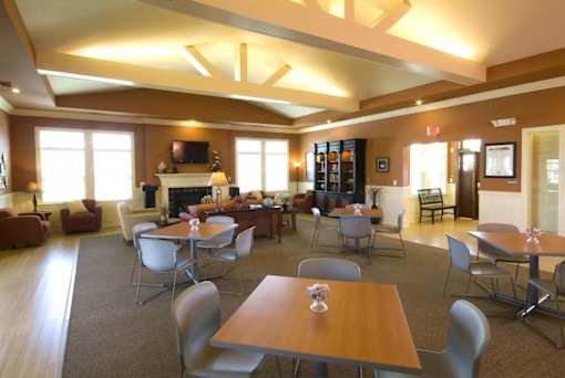 Lounge area at Meredith Meadows Apartments with comfortable seating.