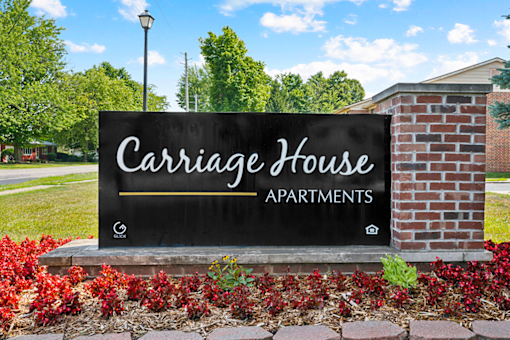 Monument sign for Carriage House Apartments in La Porte, IN.