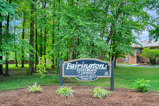Monument sign at the entrance of Fairington of Louisville, featuring the community name.