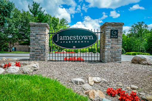 Monument sign at Jamestown Valparaiso displaying the community's name amid a landscaped background.