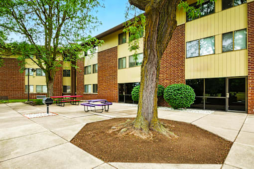 Patio area at Hammond Elderly Apartments with seating and outdoor space for residents.