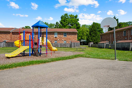 Playground and basketball court at Carriage House Apartments in La Porte, IN.