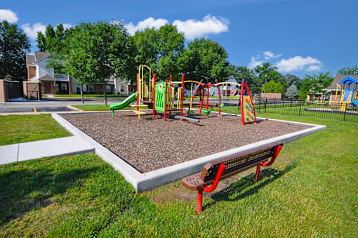 Playground featuring slides and climbing structures  at Copper Gate, Lafayette, IN