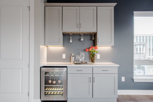 Luxury Penthouse Features Built-In Wine Cabinet at Quarry at River North Apartments, Indiana 46240