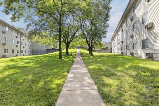 Landscaped walkway surrounds Santa Maria Apartments