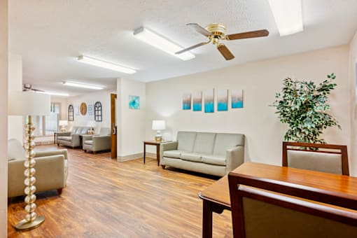 Social lobby at Blairwood Apartments in Louisville, featuring comfortable seating, stylish décor, and a welcoming atmosphere.