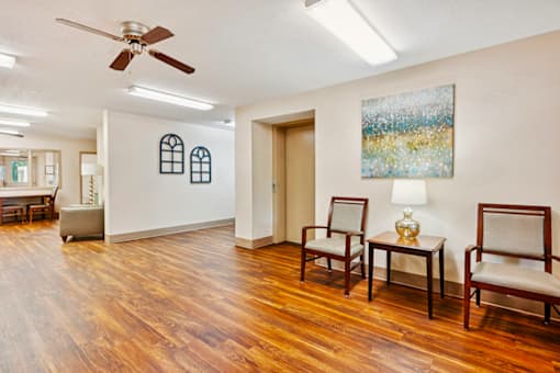 Comfortable seating area in the social lobby at Blairwood Apartments in Louisville.