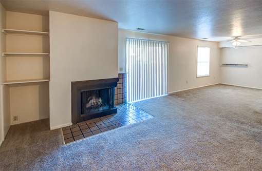 Living Room with built-in bookcase and fireplace.
