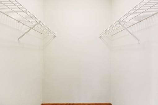 Walk-in closet in a 2-bedroom apartment at Governors Pointe Apartments.