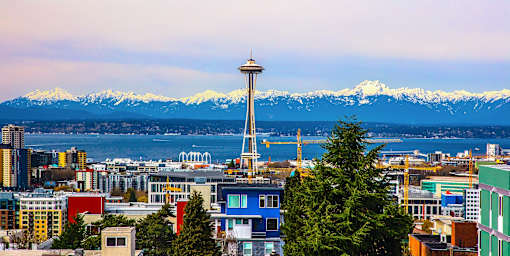 Seattle skyline view with space needle and mountains at The Lyric Apartments, Seattle, Washington