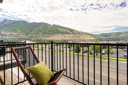 Balcony with mountain and city views at Liberty Point Apartments, Draper