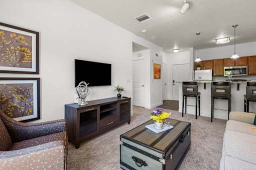 Open concept living room and kitchen area at Liberty Gateway Apartments, Utah