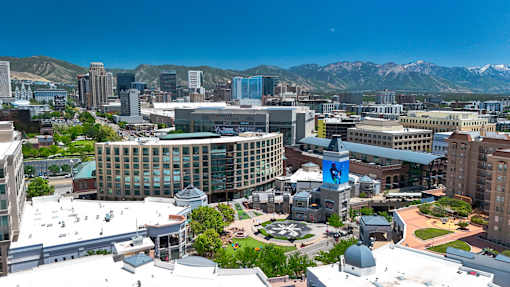 Aerial view of downtown urban skyline with mountains at Liberty Gateway Apartments, Salt Lake City, 84101