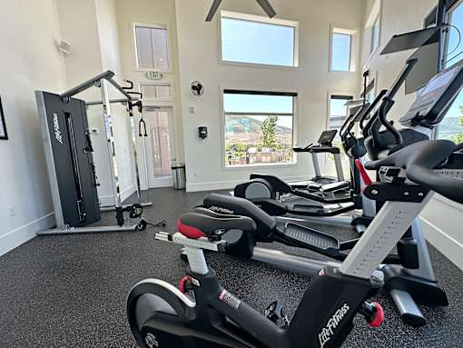 Fitness center with cardio and strength equipment at Liberty Point Apartments, Draper, UT 84020