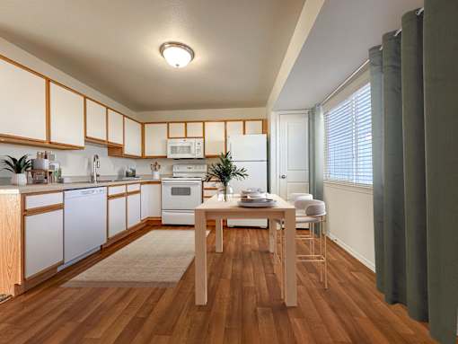 Kitchen and dining area with wood table at Liberty Hill Apartments, Draper, UT 84020