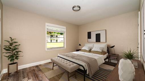 a bedroom with a large bed and a window