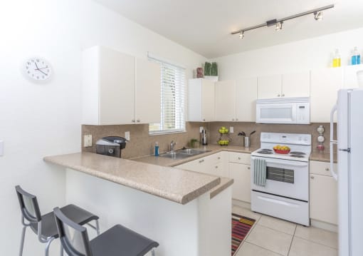a bathroom with a sink toilet and a  walk-in shower