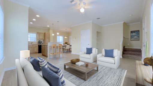 A living room with a white couch and a coffee table.