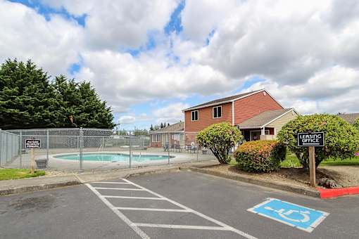 An outdoor pool by the leasing office.