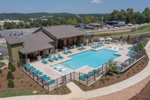 The large pool and sundeck outback of the clubhouse at Canopy Park Apartments, Pelham, AL