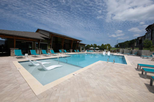 Canopy Park Apartments vacation-inspired swimming pool and sundeck at Canopy Park Apartments, Pelham, AL 35124