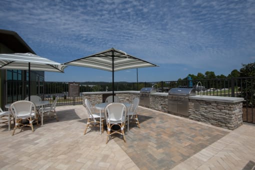 the grilling and picnic area on the sundeck at Canopy Park Apartments, Pelham, AL