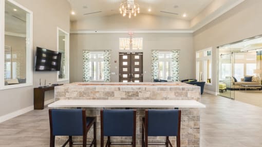 clubhouse leasing area with table and chairs