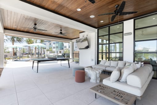 Relaxation deck with lounge and ping pong table at Lake Nona Concorde