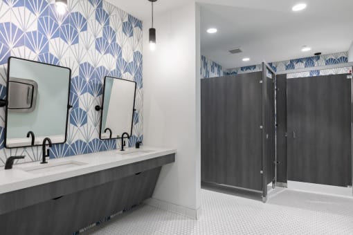 the clubhouse bathroom at Lake Nona Concorde with blue and white wall tiles