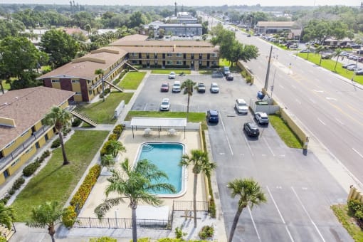 a view of the pool and the building from above