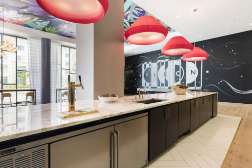 communal kitchen and bar in Pixon's clubhouse at Lake Nona Pixon, Orlando, FL