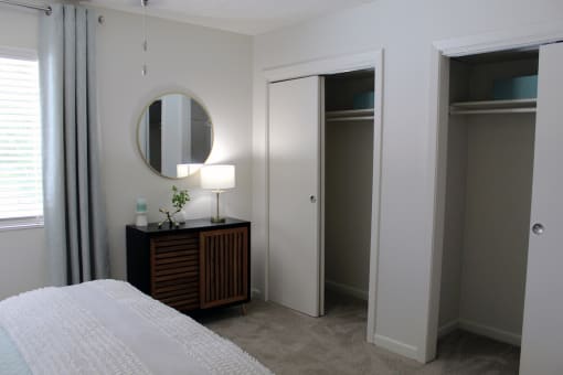 two double closets in bedroom with plush carpeting  at Huntsville Landing Apartments, Huntsville, Alabama