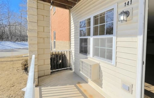 a porch outside an apartment at Algonquin Manor Senior Apartments for rent