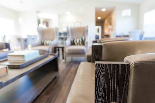 A living room with a couch and a coffee table.
