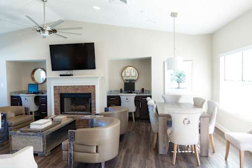 A living room with a fireplace and a television.